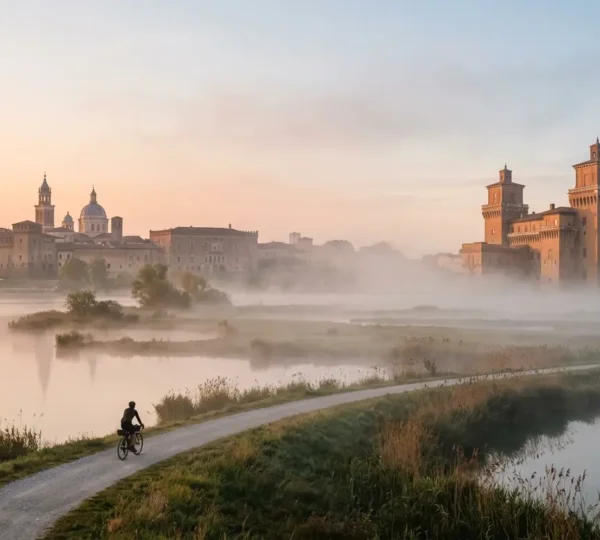 Vista panoramica di Mantova e Ferrara con architettura rinascimentale e atmosfera nebbiosa